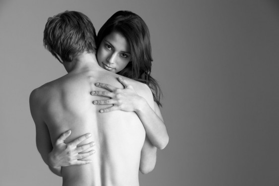 Young Naked Couple Embracing