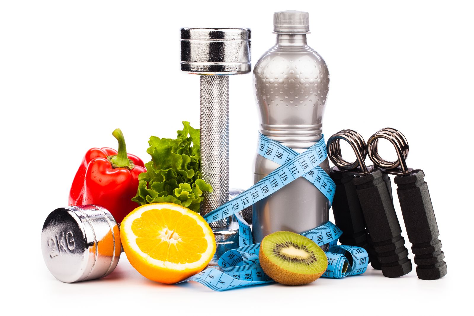 Frutas, verduras y equipo para ejercicio