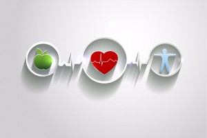 manzana, corazón y cuerpo humano encerrados en circulos conectados por ritmos cardíacos