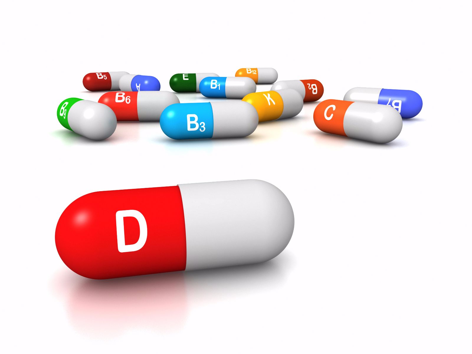 ilustración de capsulas con letras al frente una roja con la letra "D"
