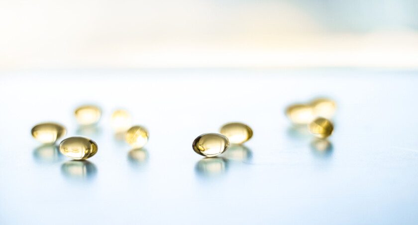 Vitamina D y oro píldoras Omega 3